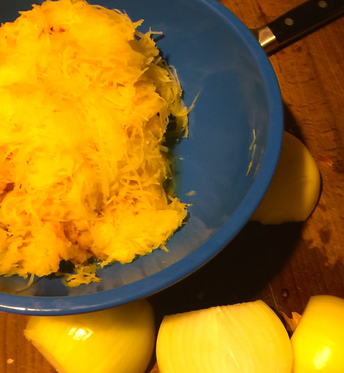 The cooked spaghetti squash is shredded.